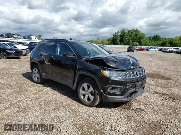 2021 Jeep Compass Latitude with VIN 3C4NJDBB7MT550913, listed as a Copart auction lot 69798575 with 56,228 mi miles and Salvage title. Bid and sale history available at DreamBid. Image 14.