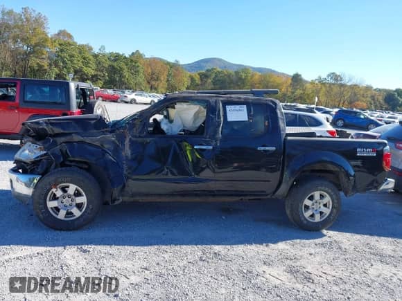 2008 Nissan Frontier SE z VIN 1N6AD07W88C407025, wystawiony jako IAAI lot #43456861 z przebiegiem Nie podano mil oraz . Historia ofert i sprzedaży dostępna na DreamBid. Obrazek 13.