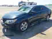 2014 Toyota Camry SE with VIN 4T1BF1FK8EU387561, listed as a IAAI auction lot 43310398 with 168,479 mi miles and . Bid and sale history available at DreamBid. Image 2.