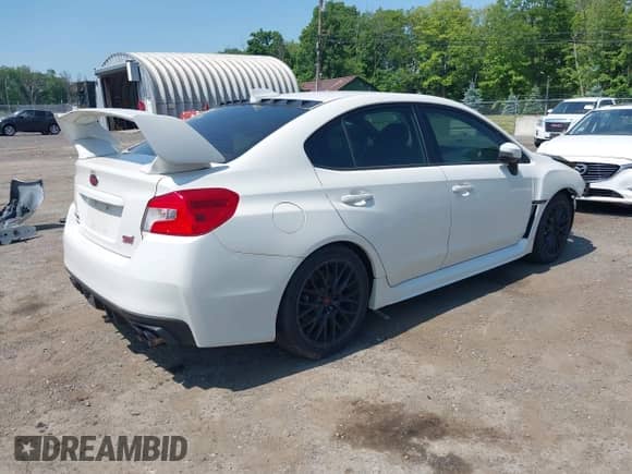 2017 Subaru WRX STI with VIN JF1VA2M64H9831592, listed as a IAAI auction lot 42424726 with 90,595 mi miles and . Bid and sale history available at DreamBid. Image 4.