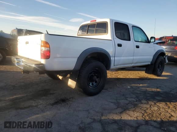 2002 Toyota Tacoma with VIN 5TEHN72N52Z000505, listed as a Copart auction lot 87218975 with 172,263 mi miles and Salvage title. Bid and sale history available at DreamBid. Image 3.