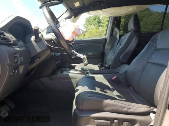 2021 Honda Passport Touring with VIN 5FNYF8H95MB029567, listed as a Copart auction lot 65695625 with 36,336 mi miles and Salvage title. Bid and sale history available at DreamBid. Image 7.