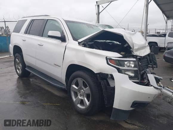 2018 Chevrolet Tahoe LT z VIN 1GNSKBKC7JR351112, wystawiony jako IAAI lot #41732631 z przebiegiem 103 771 mil mil oraz . Historia ofert i sprzedaży dostępna na DreamBid. Obrazek 1.