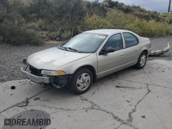 2000 Dodge Stratus SE with VIN 1B3EJ46X3YN281645, listed as a Copart auction lot 80861105 with 190,878 mi miles and Salvage title. Bid and sale history available at DreamBid. Image 1.