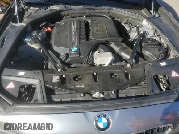 2014 BMW 5 Series 535i xDrive with VIN WBA5B3C54ED535127, listed as a Copart auction lot 85128895 with 115,680 mi miles and Salvage title. Bid and sale history available at DreamBid. Image 11.