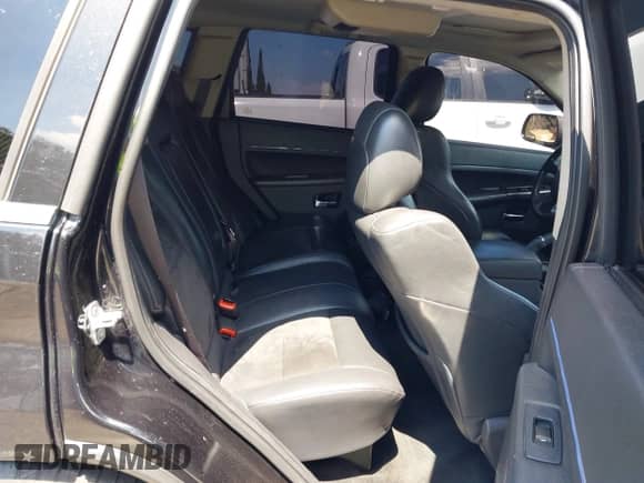 2009 Jeep Grand Cherokee with VIN 1J8HR78W89C520526, listed as a IAAI auction lot 43193483 with 102,738 mi miles and . Bid and sale history available at DreamBid. Image 8.