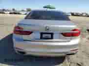 2018 BMW 7 Series 740i z VIN WBA7E2C59JG742180, wystawiony jako Copart lot #60425995 z przebiegiem Nie podano mil oraz Nie do naprawy • Non repairable. Historia ofert i sprzedaży dostępna na DreamBid. Obrazek 6.