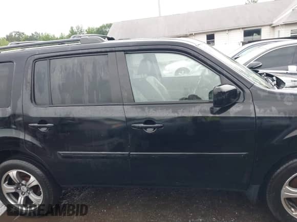 2013 Honda Pilot EX-L with VIN 5FNYF4H60DB040166, listed as a IAAI auction lot 42624940 with 216,462 mi miles and . Bid and sale history available at DreamBid. Image 12.