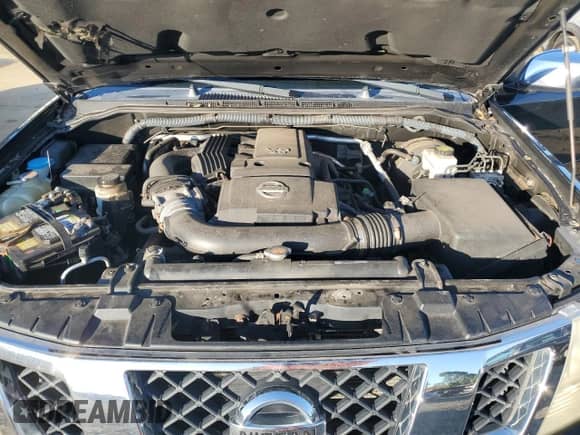 2011 Nissan Frontier Pro-4X with VIN 1N6AD0EVXBC451349, listed as a Copart auction lot 82235765 with 130,015 mi miles and Salvage title. Bid and sale history available at DreamBid. Image 11.