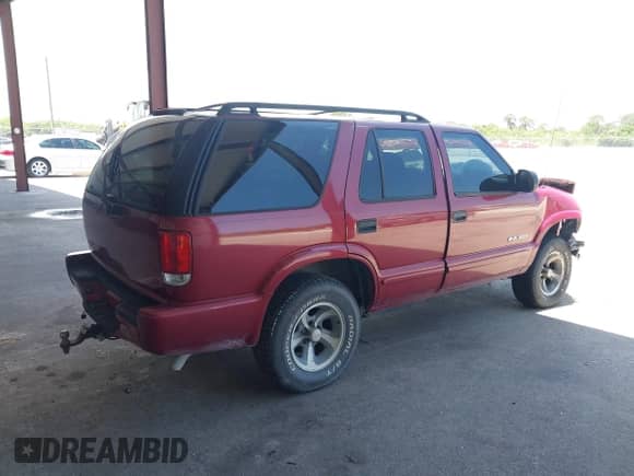 2004 Chevrolet Blazer LS with VIN 1GNCS13X24K122415, listed as a IAAI auction lot 42712980 with 191,100 mi miles and . Bid and sale history available at DreamBid. Image 4.
