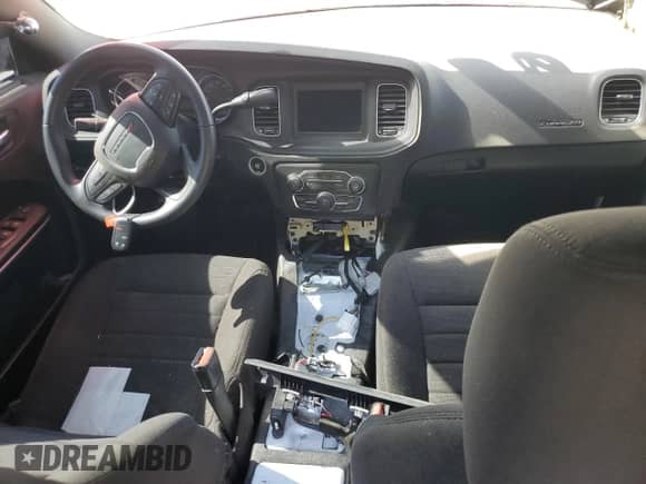 2023 Dodge Charger Police z VIN 2C3CDXAT6PH581176, wystawiony jako Copart lot #65977865 z przebiegiem Nie podano mil oraz Szkoda całkowita • Salvage title. Historia ofert i sprzedaży dostępna na DreamBid. Obrazek 8.