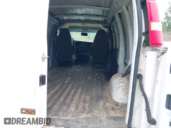 2011 Chevrolet Express Cargo with VIN 1GCWGFCA8B1135785, listed as a IAAI auction lot 42904485 with 193,162 mi miles and . Bid and sale history available at DreamBid. Image 8.
