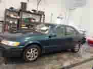 1997 Toyota Camry LE z VIN 4T1BF22K5VU903726, wystawiony jako IAAI lot #41552016 z przebiegiem 121 079 mil mil oraz . Historia ofert i sprzedaży dostępna na DreamBid. Obrazek 14.
