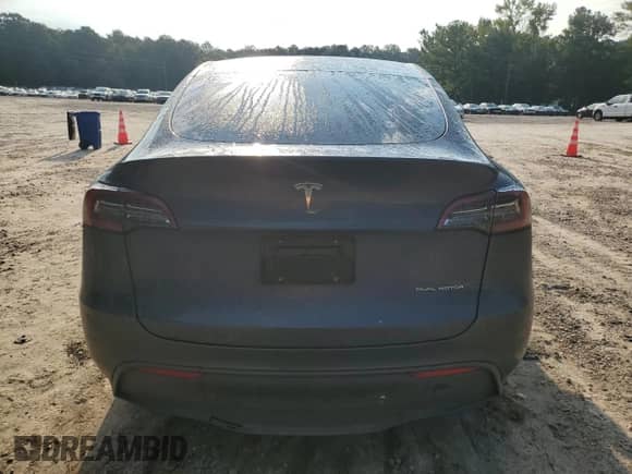 2023 Tesla Model Y Long Range with VIN 7SAYGAEE4PF668889, listed as a Copart auction lot 67239314 with 26,874 mi miles and Salvage title. Bid and sale history available at DreamBid. Image 6.
