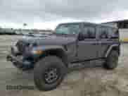 2021 Jeep Wrangler Unlimited Rubicon 392 with VIN 1C4JJXSJ3MW634325, listed as a Copart auction lot 42296345 with 52,209 mi miles and Clean title. Bid and sale history available at DreamBid. Image 1.