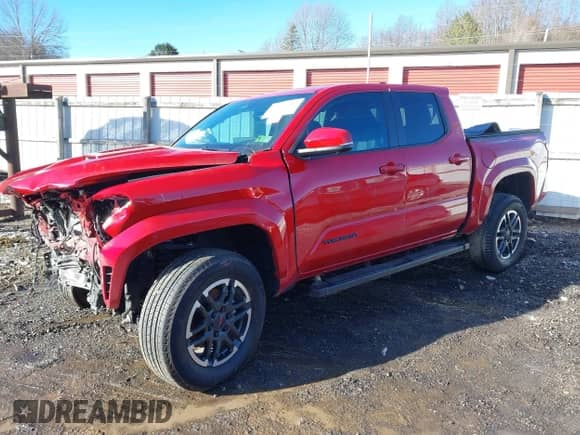 2024 Toyota Tacoma SR5 with VIN 3TYLB5JN1RT001686, listed as a IAAI auction lot 41071582 with 5,986 mi miles and . Bid and sale history available at DreamBid. Image 18.