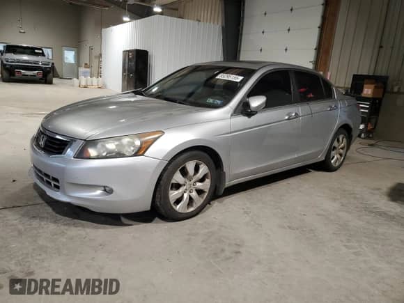 2009 Honda Accord EX-L with VIN 1HGCP36809A026730, listed as a Copart auction lot 85295155 with 184,952 mi miles and Salvage title. Bid and sale history available at DreamBid. Image 1.