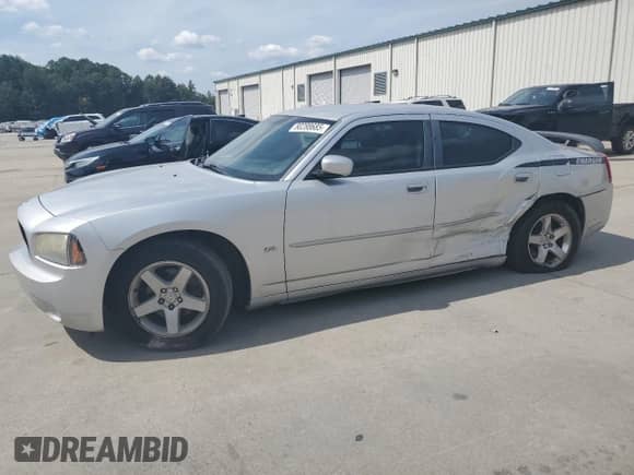 2010 Dodge Charger SXT z VIN 2B3CA3CV4AH214264, wystawiony jako Copart lot #80288685 z przebiegiem 228 526 mil mil oraz Szkoda całkowita • Salvage title. Historia ofert i sprzedaży dostępna na DreamBid. Obrazek 1.