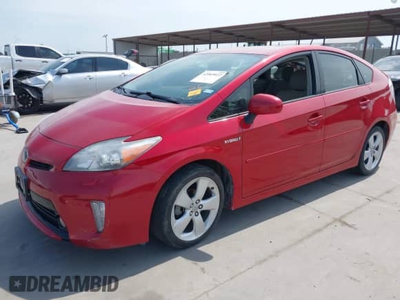 2012 Toyota Prius One with VIN JTDKN3DU8C5499775, listed as a IAAI auction lot 42065022 with 104,499 mi miles and . Bid and sale history available at DreamBid. Image 2.
