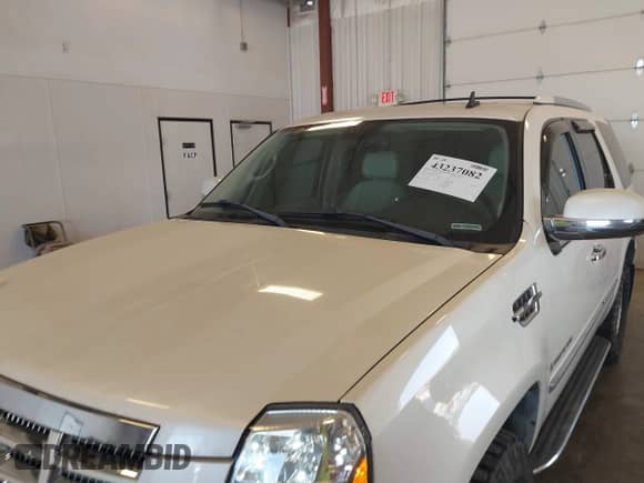 2007 Cadillac Escalade z VIN 1GYFK63817R197625, wystawiony jako IAAI lot #43237082 z przebiegiem 149 088 mil mil oraz . Historia ofert i sprzedaży dostępna na DreamBid. Obrazek 6.