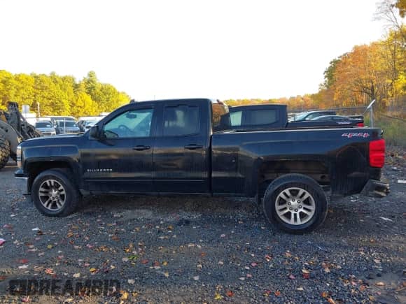 2015 Chevrolet Silverado 1500 LT z VIN 1GCVKREC1FZ434701, wystawiony jako IAAI lot #43467382 z przebiegiem 218 493 mil mil oraz . Historia ofert i sprzedaży dostępna na DreamBid. Obrazek 14.