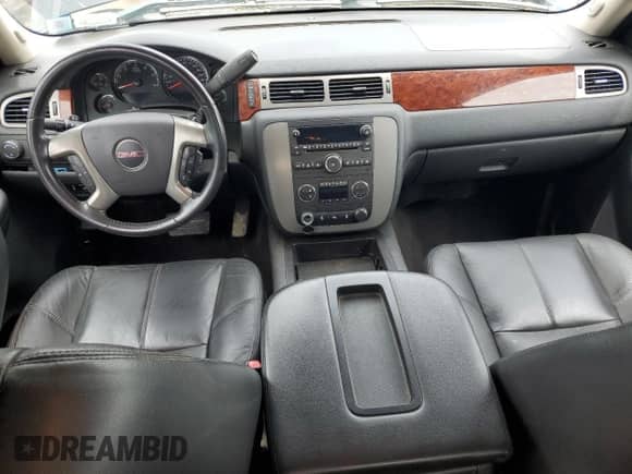 2012 GMC Sierra 1500 SLT with VIN 1GTR2WE75CZ337757, listed as a Copart auction lot 57753085 with 126,971 mi miles and Salvage title. Bid and sale history available at DreamBid. Image 8.