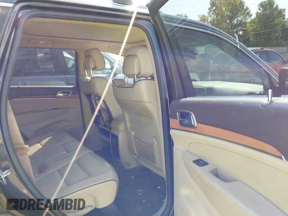 2011 Jeep Grand Cherokee Overland Summit with VIN 1J4RR6GT8BC607467, listed as a IAAI auction lot 43211985 with 95,081 mi miles and . Bid and sale history available at DreamBid. Image 8.