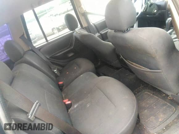 2003 Jeep Grand Cherokee Laredo z VIN 1J4GX48S53C543557, wystawiony jako IAAI lot #43123734 z przebiegiem 312 304 mil mil oraz . Historia ofert i sprzedaży dostępna na DreamBid. Obrazek 8.