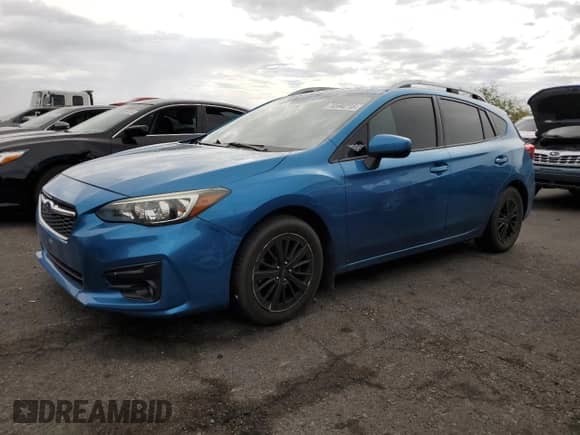 2018 Subaru Impreza Premium with VIN 4S3GTAD6XJ3733585, listed as a Copart auction lot 70594215 with 72,417 mi miles and Salvage title. Bid and sale history available at DreamBid. Image 1.