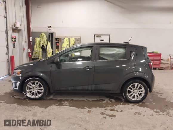 2016 Chevrolet Sonic LT with VIN 1G1JC6SB5G4183436, listed as a IAAI auction lot 41025761 with 123,703 mi miles and . Bid and sale history available at DreamBid. Image 14.