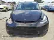 2022 Tesla Model Y Long Range with VIN 7SAYGAEE0NF340771, listed as a Copart auction lot 85189405 with 60,930 mi miles and Salvage title. Bid and sale history available at DreamBid. Image 5.