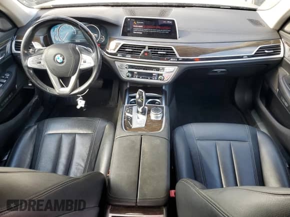 2018 BMW 7 Series 740i with VIN WBA7E2C5XJG742432, listed as a Copart auction lot 70258945 with 65,223 mi miles and Salvage title. Bid and sale history available at DreamBid. Image 8.