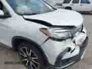 2021 Honda Pilot Elite with VIN 5FNYF6H04MB079091, listed as a IAAI auction lot 42739979 with 62,723 mi miles and . Bid and sale history available at DreamBid. Image 20.