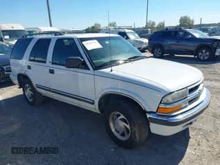 2000 Chevrolet Blazer LS with VIN 1GNDT13WXY2263912, listed as a IAAI auction lot 43342522 with 237,023 mi miles and . Bid and sale history available at DreamBid. Image 1.