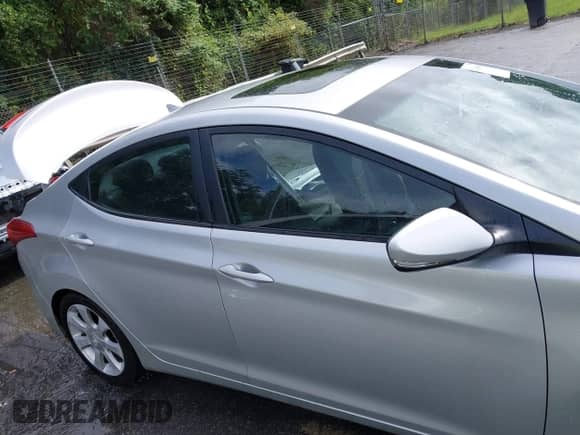 2012 Hyundai Elantra GLS with VIN KMHDH4AE3CU181552, listed as a IAAI auction lot 42964903 with 119,667 mi miles and . Bid and sale history available at DreamBid. Image 14.