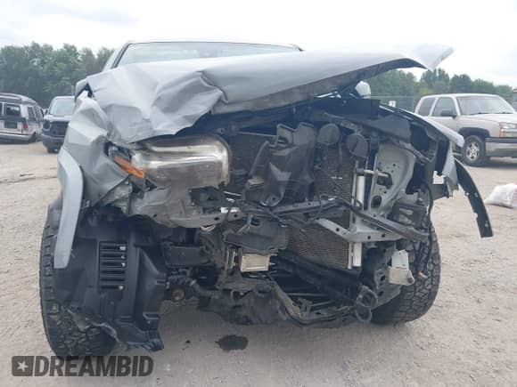 2021 Toyota Tacoma SR5 z VIN 3TMDZ5BN7MM106221, wystawiony jako IAAI lot #42827931 z przebiegiem 71 851 mil mil oraz . Historia ofert i sprzedaży dostępna na DreamBid. Obrazek 6.