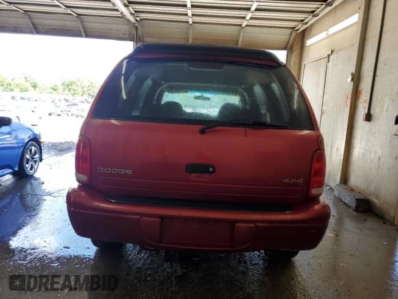 1998 Dodge Durango with VIN 1B4HS28Y5WF100889, listed as a Copart auction lot 57709425 with 261,895 mi miles and Salvage title. Bid and sale history available at DreamBid. Image 6.