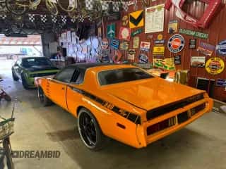1974 Dodge Charger z VIN WH23G4G117737, wystawiony jako Copart lot #85356844 z przebiegiem 91 490 mil mil oraz Czysty tytuł • Clean title. Historia ofert i sprzedaży dostępna na DreamBid. Obrazek 3.