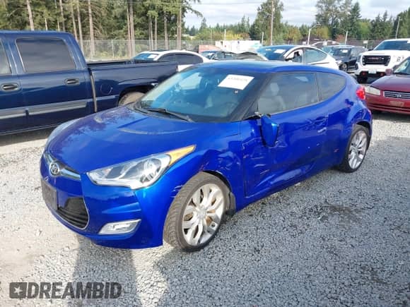 2012 Hyundai Veloster w/Black Int z VIN KMHTC6ADXCU064435, wystawiony jako IAAI lot #43200428 z przebiegiem 49 230 mil mil oraz . Historia ofert i sprzedaży dostępna na DreamBid. Obrazek 17.