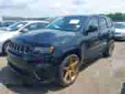 2018 Jeep Grand Cherokee Trackhawk with VIN 1C4RJFN96JC293806, listed as a IAAI auction lot 42503526 with 42,666 mi miles and . Bid and sale history available at DreamBid. Image 2.