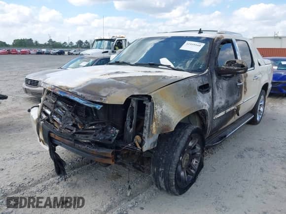 2007 Cadillac Escalade EXT with VIN 3GYFK62847G231820, listed as a IAAI auction lot 41959168 with Not provided miles and . Bid and sale history available at DreamBid. Image 6.