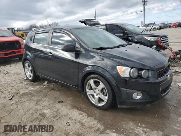 2012 Chevrolet Sonic LTZ с VIN 1G1JF6SH2C4113477, выставлен на аукционе Copart как лот 87371614 с пробегом 90 981 миль миль и Списание • Salvage title. История ставок и продаж доступна на DreamBid. Изображение 4.