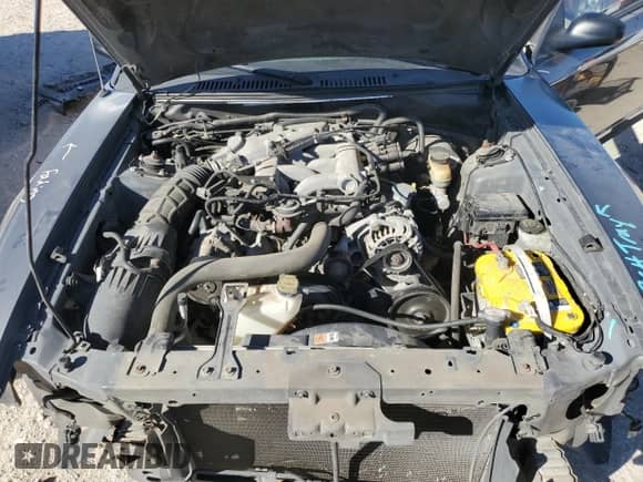 2004 Ford Mustang Deluxe с VIN 1FAFP44404F117628, выставлен на аукционе Copart как лот 81377524 с пробегом 39 697 миль миль и Списание • Salvage title. История ставок и продаж доступна на DreamBid. Изображение 11.