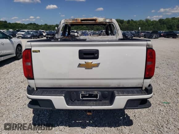 2020 Chevrolet Colorado 2WD Work Truck с VIN 1GCGSBEN9L1184586, выставлен на аукционе Copart как лот 58212235 с пробегом Не указан миль и На запчасти • Non repairable. История ставок и продаж доступна на DreamBid. Изображение 6.
