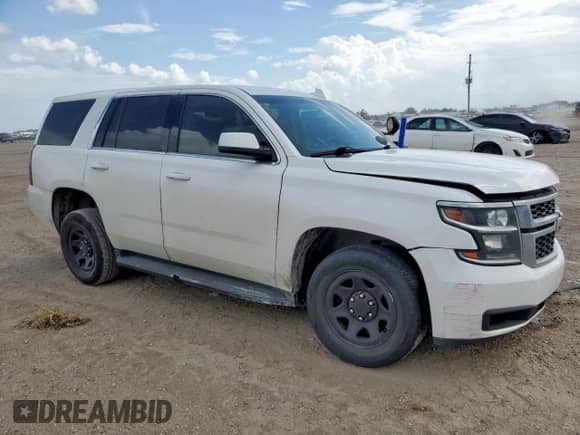 2015 Chevrolet Tahoe Commercial с VIN 1GNLC2EC0FR562690, выставлен на аукционе Copart как лот 63842085 с пробегом 182 732 миль миль и Списание • Salvage title. История ставок и продаж доступна на DreamBid. Изображение 4.