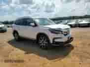 2020 Honda Pilot Touring 8-Passenger z VIN 5FNYF5H94LB011994, wystawiony jako Copart lot #56168045 z przebiegiem 91 737 mil mil oraz Szkoda całkowita • Salvage title. Historia ofert i sprzedaży dostępna na DreamBid. Obrazek 14.