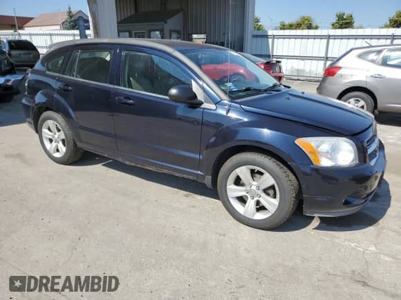 2011 Dodge Caliber Uptown with VIN 1B3CB9HB7BD168801, listed as a Copart auction lot 76898904 with 182,649 mi miles and Non repairable. Bid and sale history available at DreamBid. Image 4.