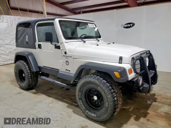 2001 Jeep Wrangler Sahara z VIN 1J4FA59S41P303519, wystawiony jako Copart lot #59899545 z przebiegiem 238 151 mil mil oraz Czysty tytuł • Clean title. Historia ofert i sprzedaży dostępna na DreamBid. Obrazek 4.