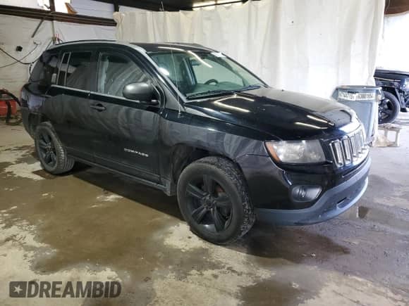 2014 Jeep Compass Sport with VIN 1C4NJCBA0ED844968, listed as a Copart auction lot 85513315 with 176,933 mi miles and Clean title. Bid and sale history available at DreamBid. Image 4.