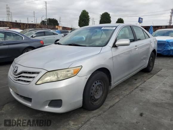 2011 Toyota Camry LE с VIN 4T1BF3EK3BU606810, выставлен на аукционе Copart как лот 85333435 с пробегом 310 762 миль миль и Списание • Salvage title. История ставок и продаж доступна на DreamBid. Изображение 1.
